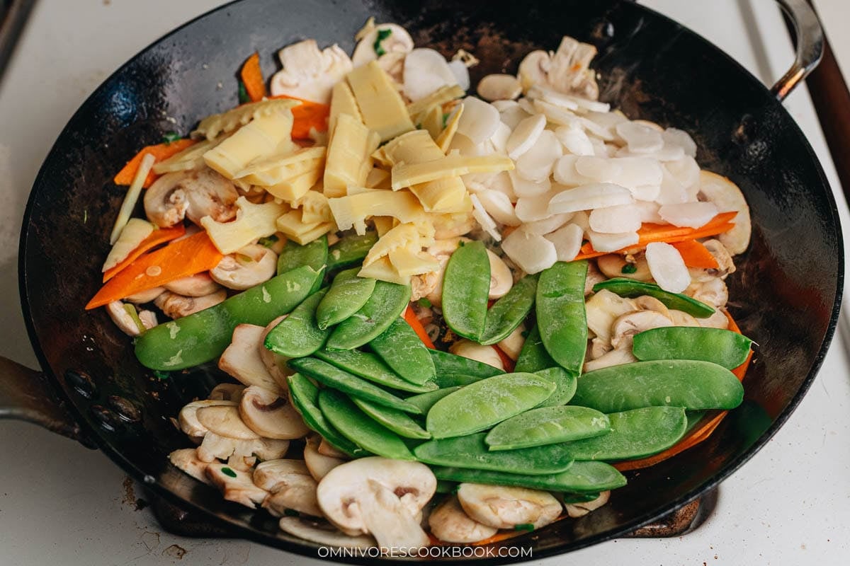 Cook the bamboo shoots and snow peas