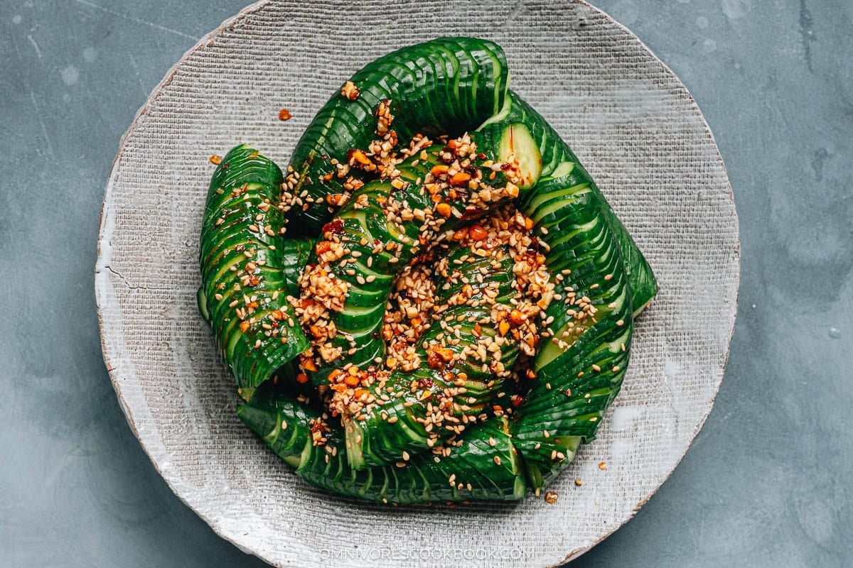 Pour the dressing over the cucumber