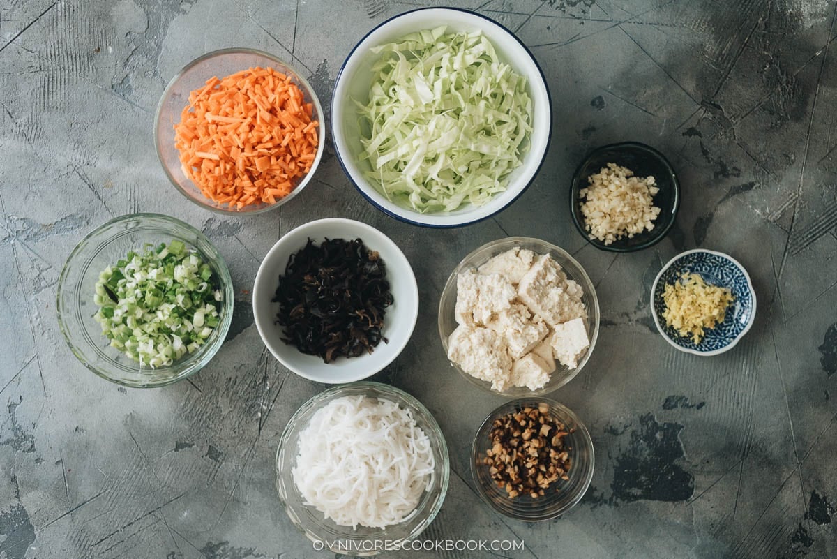 Homemade Vegan Dumplings - The dumpling filling has a well-balanced texture with veggies, tofu, and rice vermicelli. It’s seasoned with plenty of aromatics, soy sauce, and just a dash of curry powder to enhance its richness. #chinese #vegetarian Ingredients for making vegan dumplings