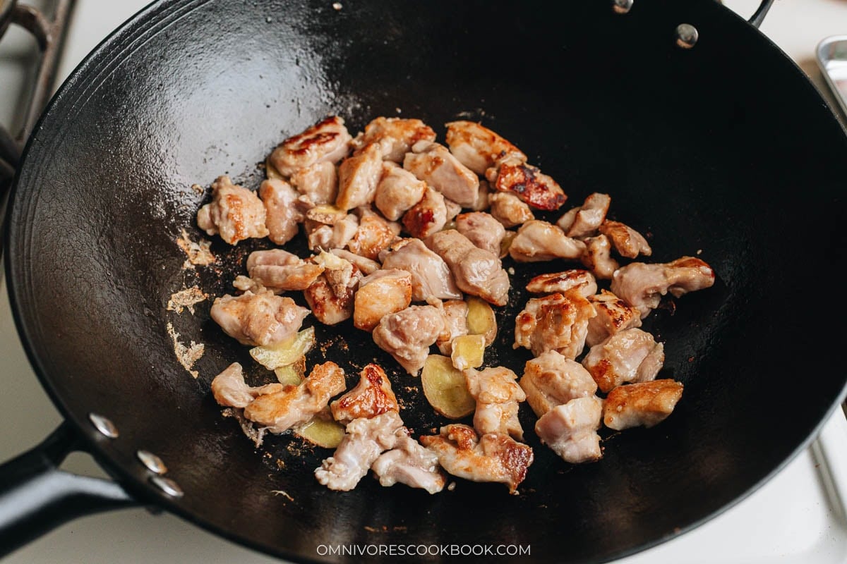 Searing the ginger and chicken