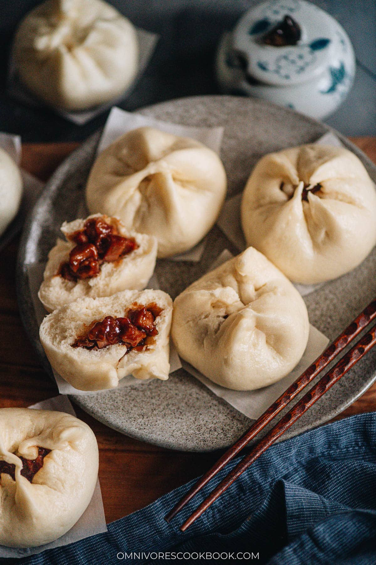 Char Siu Bao (Steamed BBQ Pork Buns) | Learn how to make authentic Chinese char siu bao just like a dim sum restaurant. The buns have very soft, fine, and fluffy bread with a juicy tender pork filling. My recipe includes detailed step-by-step photos and a video to help you achieve the best result in your own kitchen. Steamed bbq pork buns