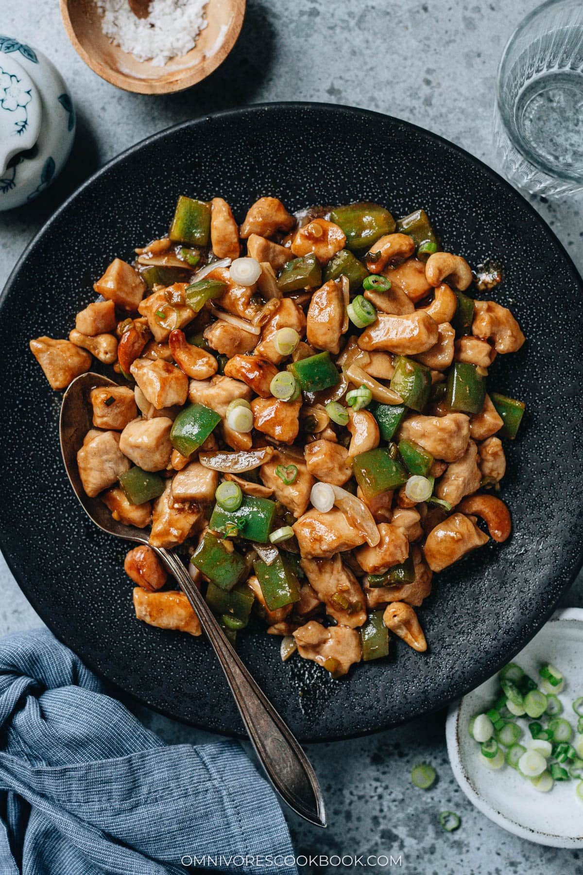 Cashew chicken served in a plate close up