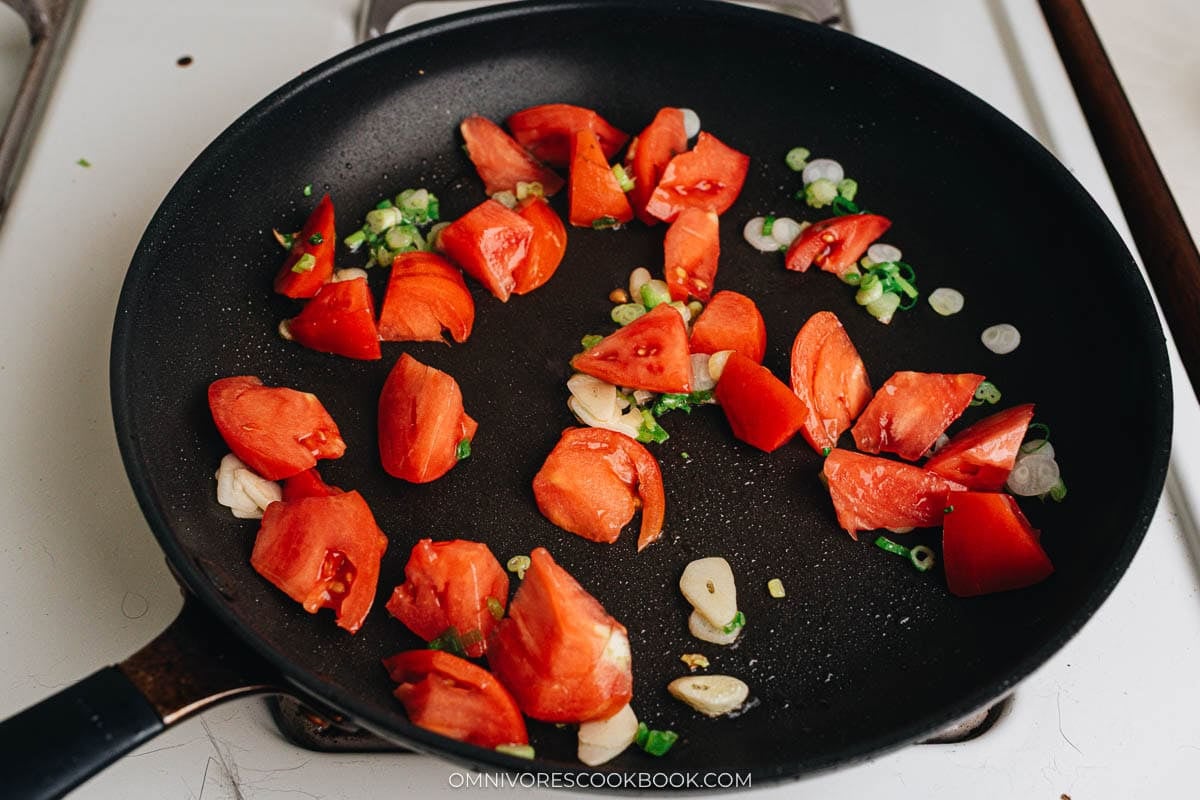 Cooking the aromatics and tomato