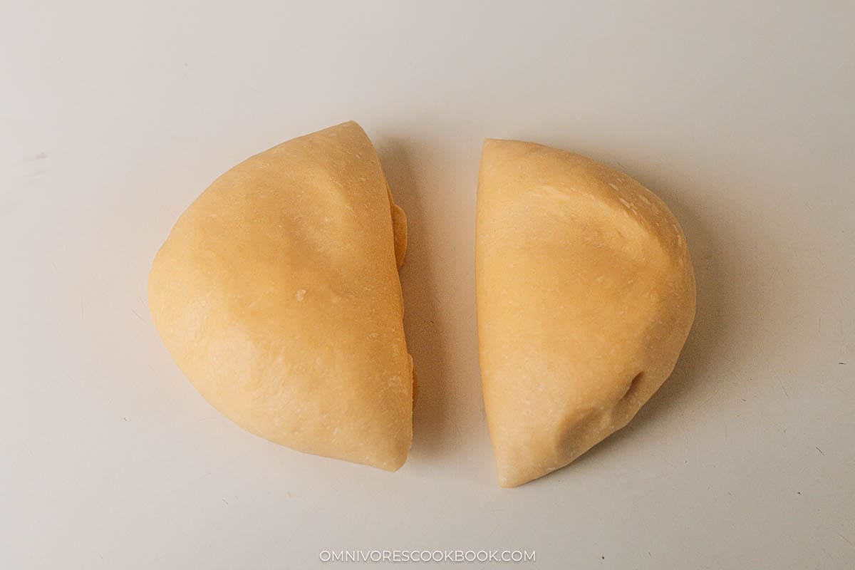Divide the dough into two pieces