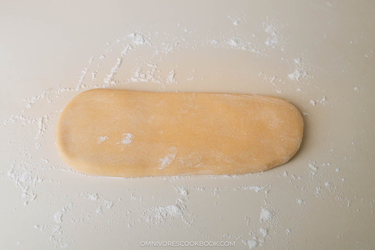 Press and roll the dough into a small rectangle.