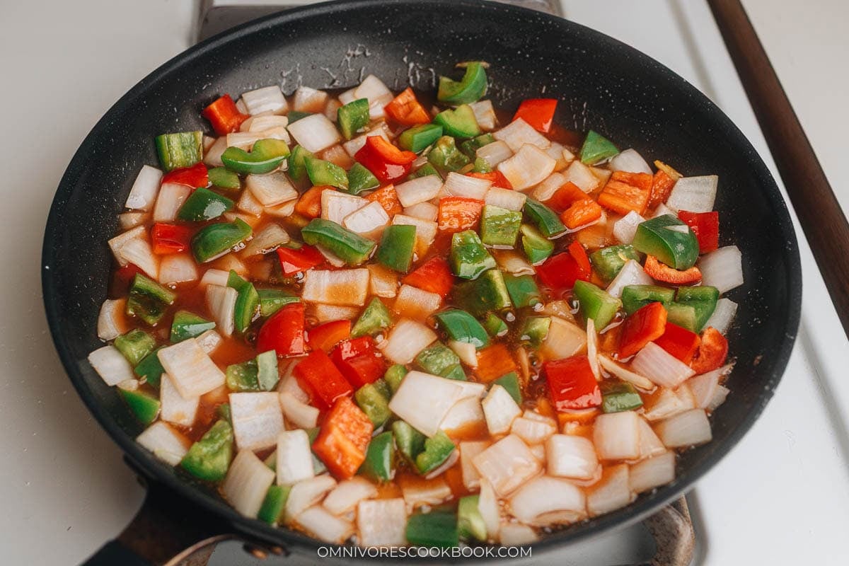 pouring the sauce with veggies