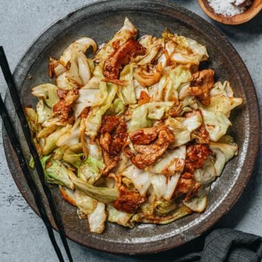 Pork and cabbage stir fry in a plate