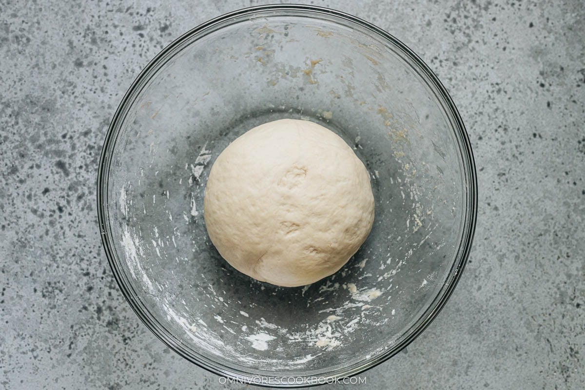 first rise of dough in a bowl