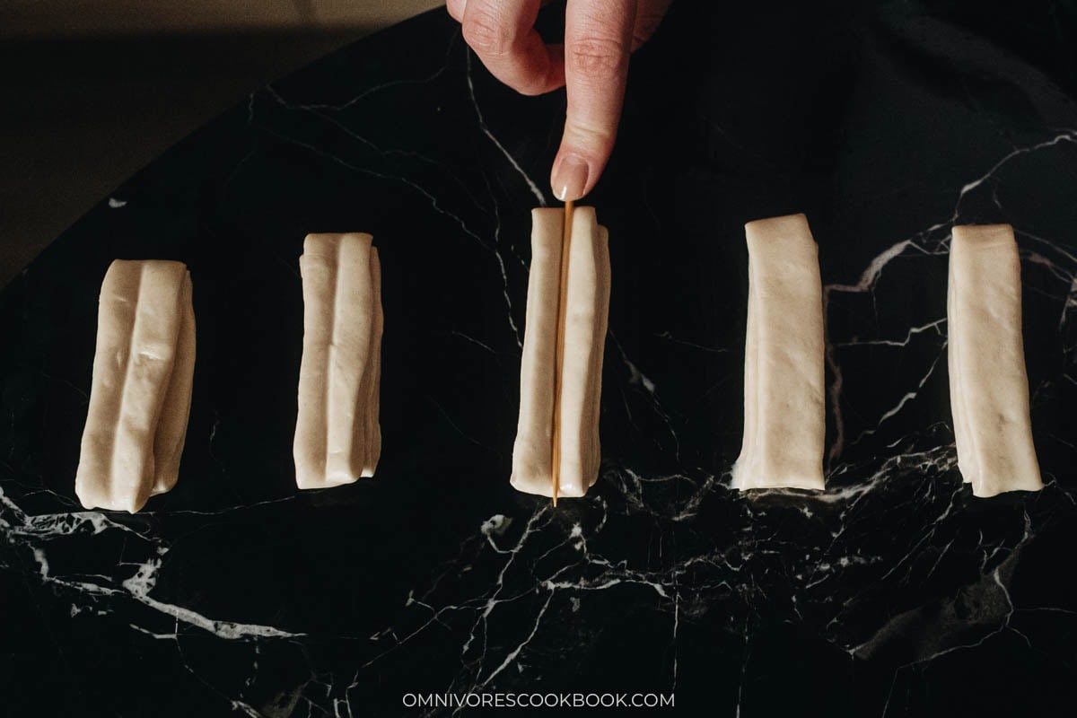 Press the dough again.