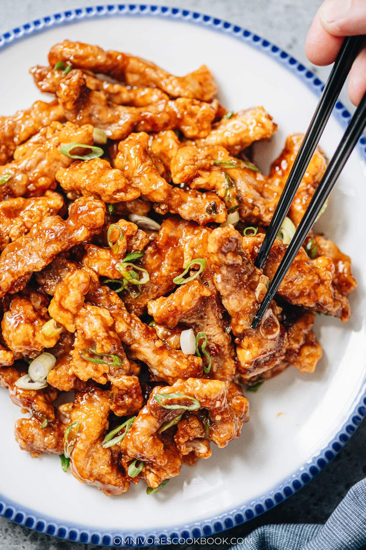 Sweet and Sour Pork (糖醋里脊) | Introducing the authentic Chinese sweet and sour pork made with lightly battered pork, pan-fried until crispy, juicy, and tender, then tossed in a fragrant sticky sauce with a perfectly balanced sweet and sour taste. It’s super easy to make and tastes way better than takeout! {Gluten-free Adaptable} Homemade sweet and sour pork